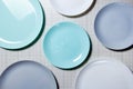 Blue table plates close-up. Background of plates. Lots of empty plates top view. Image of sets of Cutlery and plates.