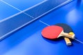 Blue table tennis or ping pong. Close-up ping-pong net. Close up ping pong net and line. Two table tennis or ping pong rackets orB Royalty Free Stock Photo