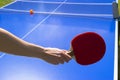 Blue table tennis or ping pong. Playing ping pong. Close up ping pong net and line. Table tennis or ping pong rackets or paddle a Royalty Free Stock Photo