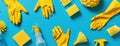 Blue Table With Yellow Gloves and Cleaning Supplies Royalty Free Stock Photo