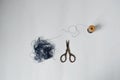 Blue tangle thread spool and retro scissors