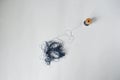 Blue tangle thread spool over white Royalty Free Stock Photo