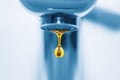 Blue tap and golden drop