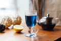 Blue tea Anchan in an Irish glass on a gray background. Cup of Butterfly pea tea, pea flowers, blue pea. Healthy, detox Royalty Free Stock Photo