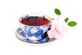 Blue tea cup and pink rose Royalty Free Stock Photo