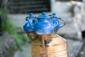 Traditional Turkish blue teapots placed above copper samovar