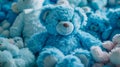 A Blue Teddy Bear Surrounded by Other Blue Teddy Bears Royalty Free Stock Photo