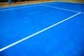 Blue tennis court abstraction. Empty sport field photo. Hard court cover for lawn tennis. Summer sport activity outdoor Royalty Free Stock Photo