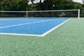 Blue Tennis court. Outdoor sunny day Royalty Free Stock Photo