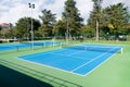 Blue Tennis court. Outdoor sunny day. Sport landscape Royalty Free Stock Photo