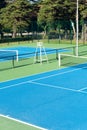 Blue Tennis court. Outdoor sunny day. Tennis concept. Copy space Royalty Free Stock Photo