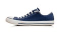 Blue tennis shoe on white