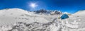 Blue tent in the snowy peaks of the mountains. cylindrical 360 panorama