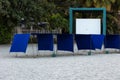 Blue tents on the empty beach in solitude