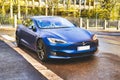 Blue Tesla Model S on Rainy Morning Royalty Free Stock Photo