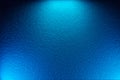 Blue textural background illuminated by three rays of light blue Royalty Free Stock Photo