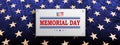 Blue textural illustration with rectangular frame, textured stars set silhouette, memorial day, design element