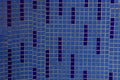 Blue texture of ceramic square tiles on a fragment of the wall Royalty Free Stock Photo