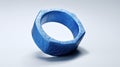 3d Printed Blue Ring With Rough Texture And Angular Forms