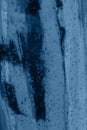 Blue textured grunge glass closeup background