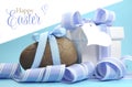 Blue theme Happy Easter chocolate egg and gift box with stripe ribbon