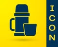 Blue Thermos container and cup icon isolated on yellow background. Thermo flask icon. Camping and hiking equipment