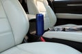 Blue thermos in holder inside of car Royalty Free Stock Photo