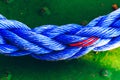 Blue thick rope on the ground