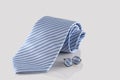 Blue tie with cuff links Royalty Free Stock Photo