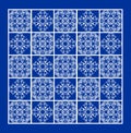 Blue tile with fine white geometric line ornaments in square, contrasting ethnic patterns