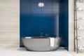 Blue tile and wood bathroom interior with tub Royalty Free Stock Photo