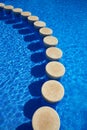 Blue tiles swimming pool water texture Royalty Free Stock Photo