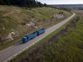 Blue tipper truck on street road highway transportation aerial Royalty Free Stock Photo