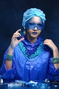 Blue Tone Fashion Scientist in Dark room laboratory with tools l