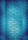 Blue toned brick wall end of the corridor, abstract background p Royalty Free Stock Photo