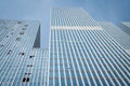 Blue toned facade of city high-rise office block Royalty Free Stock Photo