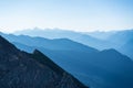 Blue toned mountain silhouette at sunrise Royalty Free Stock Photo