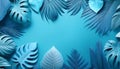 Blue-toned tropical leaves arranged in a circular pattern on a light background, showcasing intricate details and textures Royalty Free Stock Photo