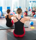 Blue toning ball in women pilates class rear view Royalty Free Stock Photo