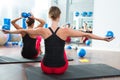 Blue toning ball in women pilates class rear view Royalty Free Stock Photo