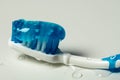 Blue tooth brush with tooth paste Royalty Free Stock Photo
