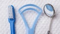 Blue toothbrush with dental tools Royalty Free Stock Photo
