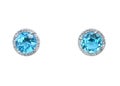 Blue topaz Gemstone and diamond earrings cushion cut with a halo setting. Royalty Free Stock Photo