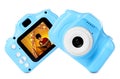 Blue toy cameras on background in collage, one with photo of boy reading book Royalty Free Stock Photo