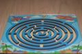 A blue toy maze