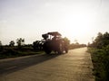 Blue tractor working on the farm. Royalty Free Stock Photo