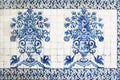 Blue traditional Portuguese ceramic tiles azulejos. Facade, wall decoration of old Coimbra university building, Portugal