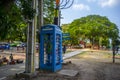 Blue traditional telephone box, just outside of Ayutthaya Historical Park, Thailand