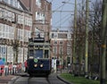 Blue tram Blauwe Tram A327 on the rails in The Hague on the Lange Vijverberg as Museum Tram. Royalty Free Stock Photo