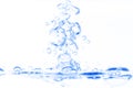 Blue transparent aqua water splash with bubbles on white clean background abstract Royalty Free Stock Photo